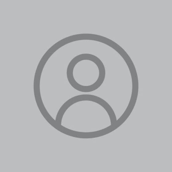 Placeholder for Staff member John Smith from 665591d869a2